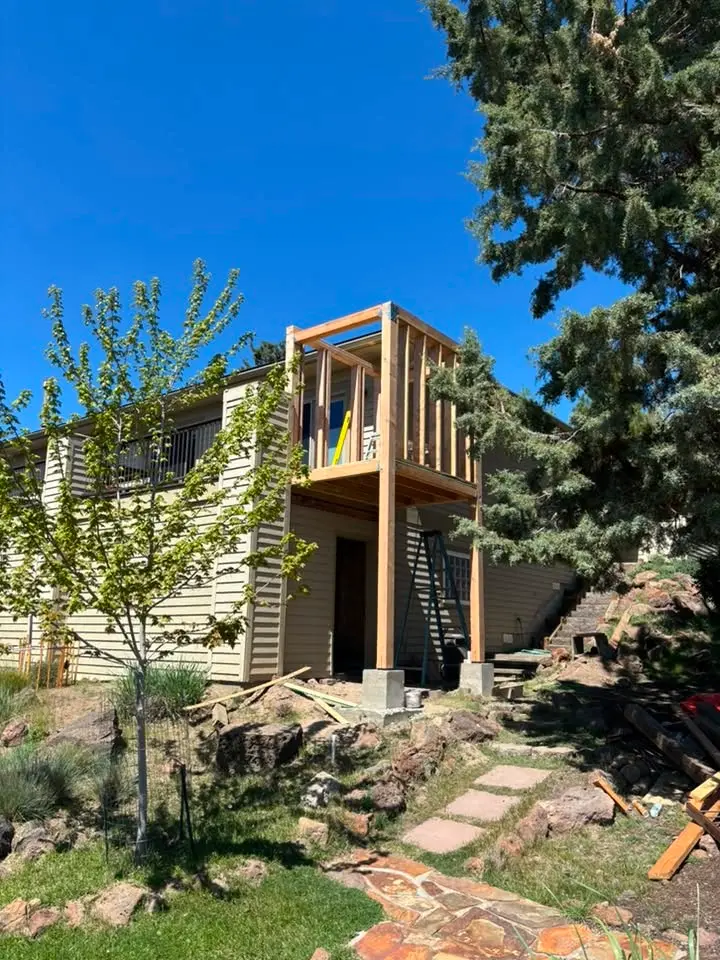 Framing for a second-story balcony addition